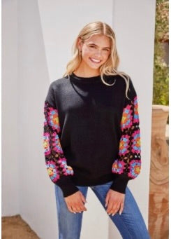 Black sweater with crochet sleeve